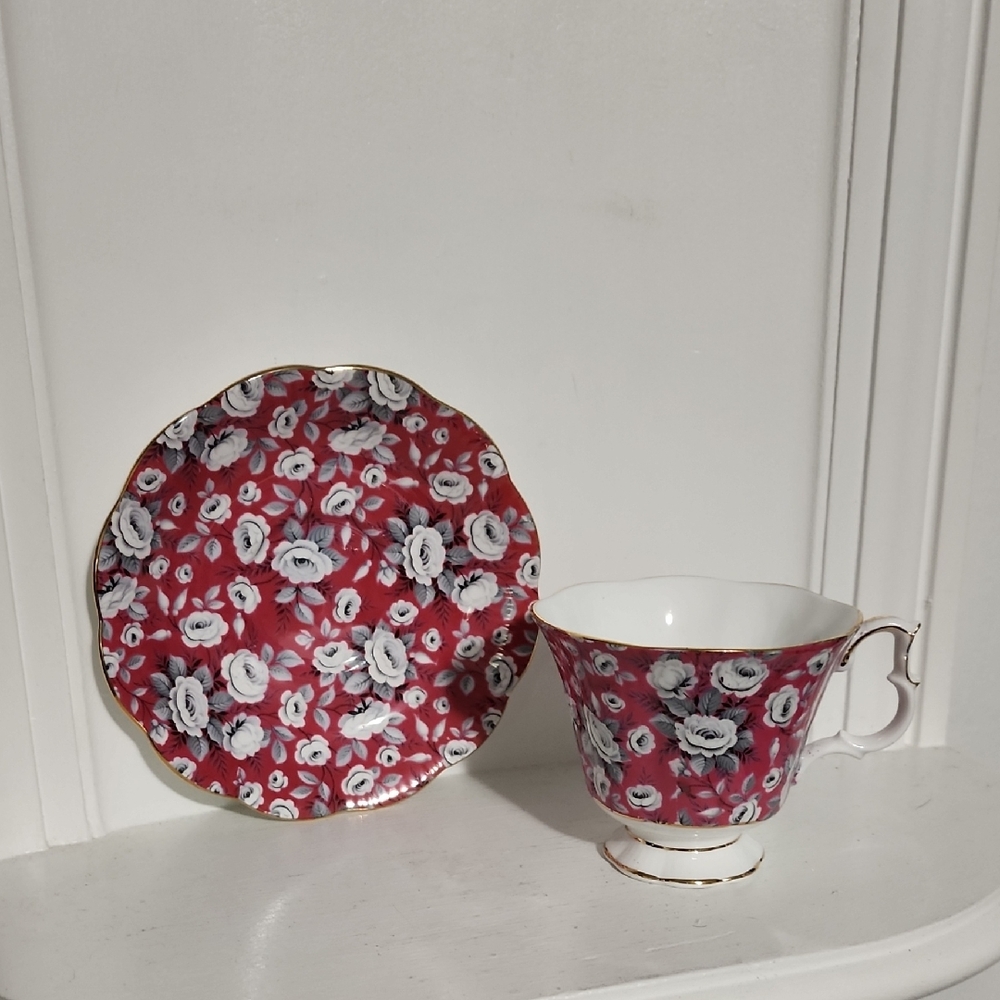 Royal Albert Chintz White Rose teacup& saucer set with raspberry red background